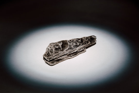 Shiny Sedimentary Rock Illuminated By Spotlight