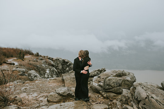 Bride and Groom Eloping on a Mountain