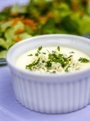 Creamy cheese sauce and salad
