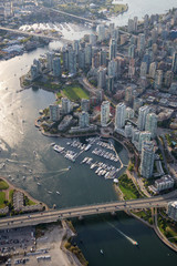 Aerial view of beautiful residential area by the quay in Downtown Vancouver, British Columbia, Canada.
