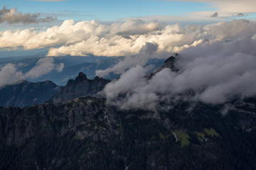 Beautiful aerial landscape view of SkyPilot Mountain covered in clouds. Picture taken near Squamish, British Columbia, Canada.