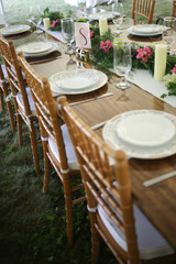 Vintage Wedding Decor Mismatched China on a Wood Table with Flowers