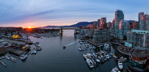 Panoramic View of False Creek in Downtown Vancouver, British Columbia, Canada. Taken from an aerial perspective during a colorful sunset.