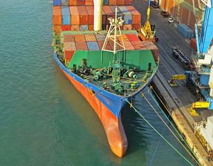 Ship loading the cargo in a port