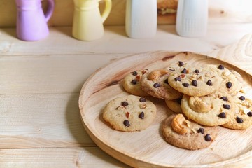 vintage concept, cookies on wooden plate with wooden background