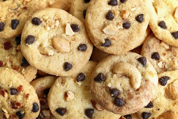 Top view and selective focus, close up chocolate chip cookies and nut