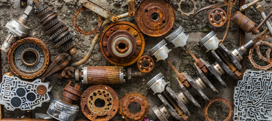 Rusted metallic car parts.