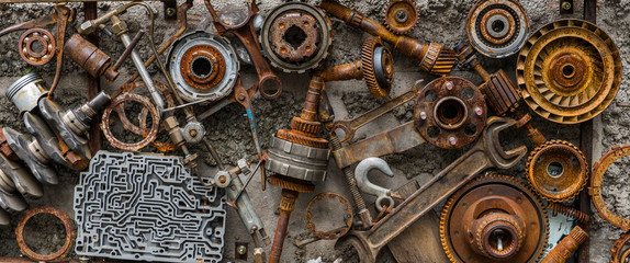 Rusted metallic car parts. - obrazy, fototapety, plakaty