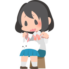 膝の上にうさぎを乗せる女の子