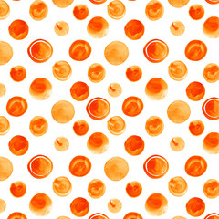 Seamless hand drawn watercolor pattern made of round orange dots, isolated over white.