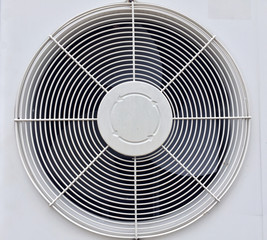 Compressor fan of air condition. Air compressor's protection grid.