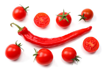 slice of tomato with chili pepper isolated on white background. top view