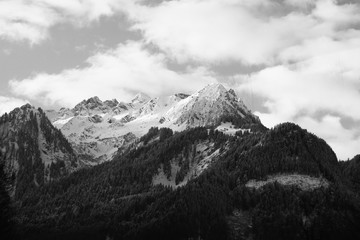 Peaks of austrian alps in winter, black and white