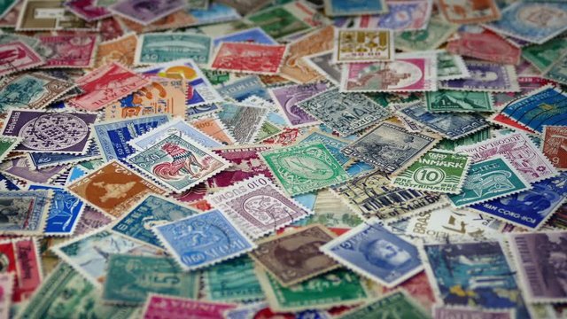 Many Old Stamps Rotating Slowly