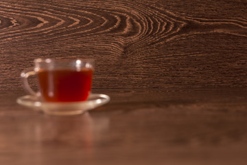 a wooden board and a cup of tea