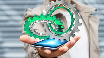 Businessman using floating modern gear mechanism 3D rendering