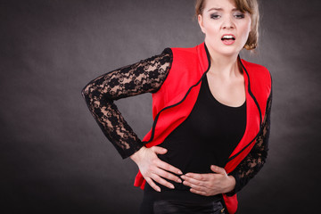 Woman with stomach ache.