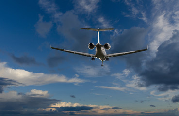 Airplane flying in sky with beautiful clouds