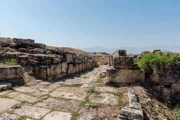 Fototapeta na wymiar Ancient ruins in Hierapolis, Pamukkale, Turkey. UNESCO World Heritage.
