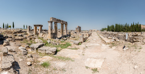 High Resolution panoramic view of latrine along Frontinus Street at Hierapolis ancient city in Pamukkale, Turkey.