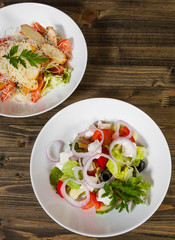 salads on wooden tabel. top view
