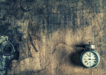 Antique alarm clock rustic wooden background vintage