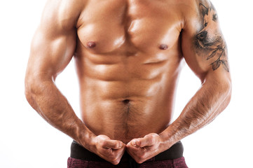 Fototapeta na wymiar Shot of muscular fitness model posing shirtless