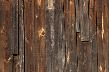 Naklejka premium Mahogany wooden texture and background with scratches, brown wood planks for display