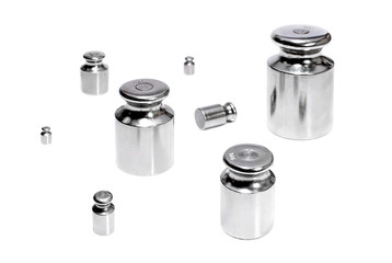 Metallic weights for scales on white background