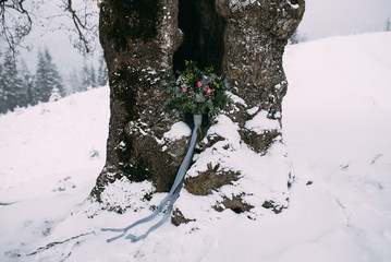 Beautiful wedding bouquet in winter during the snowy season