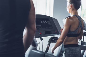 woman exercising on treadmill