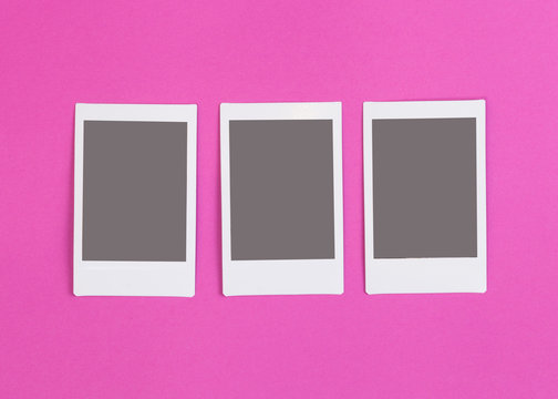 Three Instant Photos Frames On Pink Background