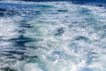 Naklejka na ściany i meble water surf on the sea surface