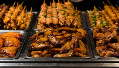 Grilled chicken wings and pork