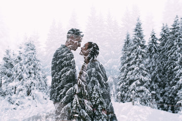 Young pretty pair of lovers. Winter. Date. A pair of lovers on a date in the mountains.