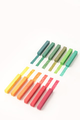 Fototapeta premium Close up view of bright colorful pastel chalks and their pigments