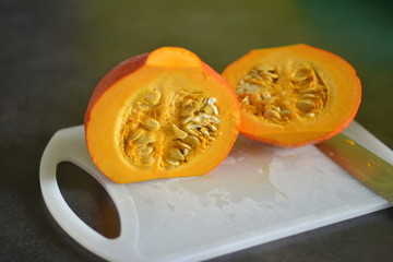 Cut pumpkin with seeds