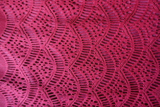 Waves pattern on ruby lace from above