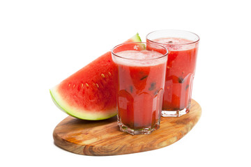 Watermelon drink in glasses with slice