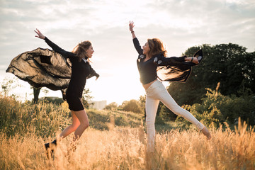 Mom with daughter  walking in the field