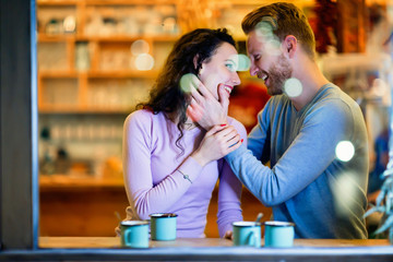 Romantic couple having date in coffee shop