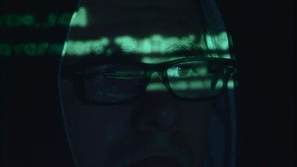 Man is hacking the cyberpolicy web site. Close up