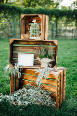 Hand made wedding decorations with wooden boxes,