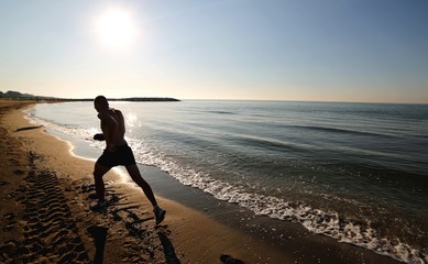 Man runs fast on the beach