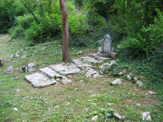 Old stone fountain in the forest