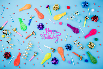 Happy birthday pattern. Festive candles, party confetti, balloons, streamers and decoration on blue...