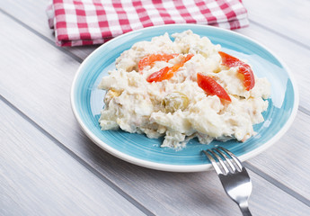 Typical dish of spain, russian salad with fork. Mediterranean diet.