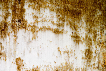 background of rusty metal painted with cracked paint