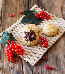 coconut cookies placed on a silver tray and tray. homemade. decorated with cups