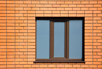 window in a brick wall in the house